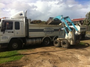 Earthmoving on a traditional suburban lot